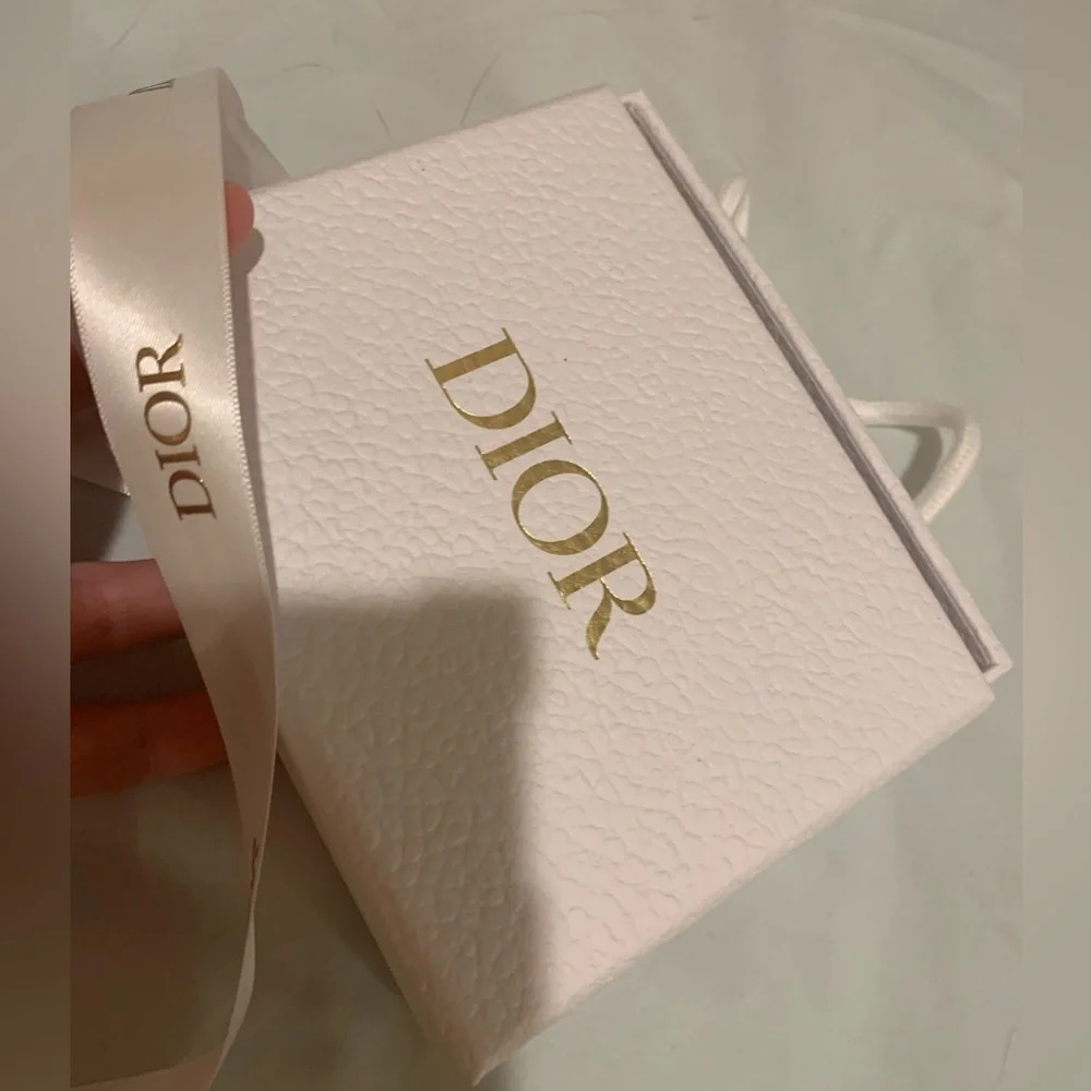 Brand new authentic Dior box textured  with opener compartment. Must have!